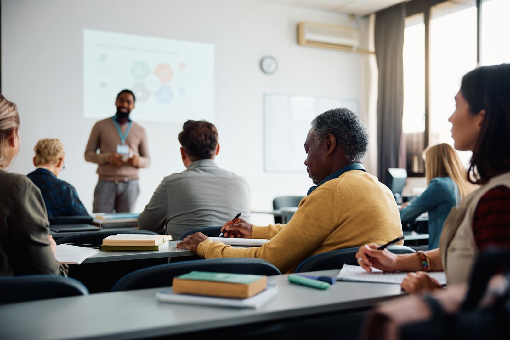 image of adults taking a training on charter petition writing