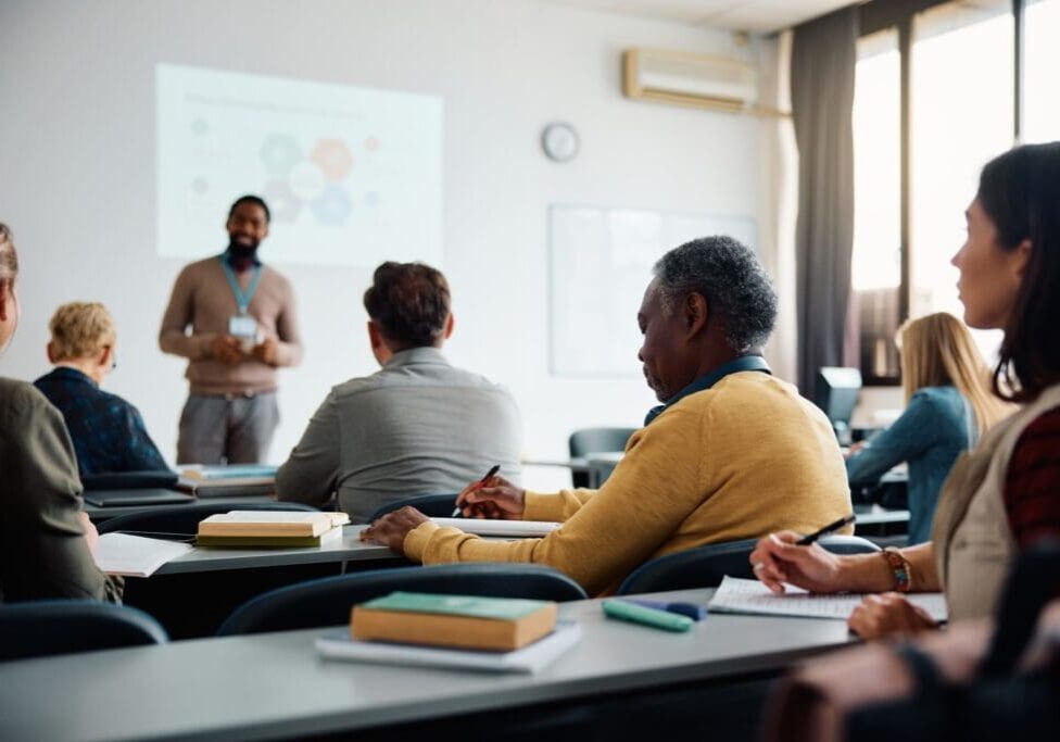 image of adults taking a training on charter petition writing